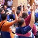 votazione per alzata di mani